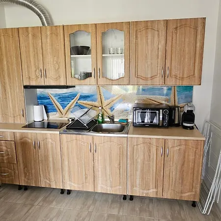 пясъчна лилия в Lily Beach Daire *